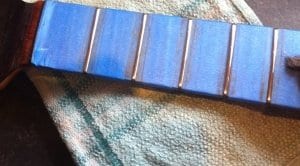Masked fretboard