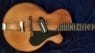 O.W. Appleton claimed that in 1943 he brought a solid body, single cutaway, electric Spanish style guitar