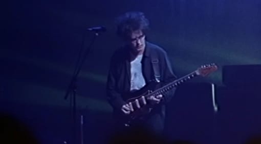 Robert Smith live in 1992 with his Fender Bass VI