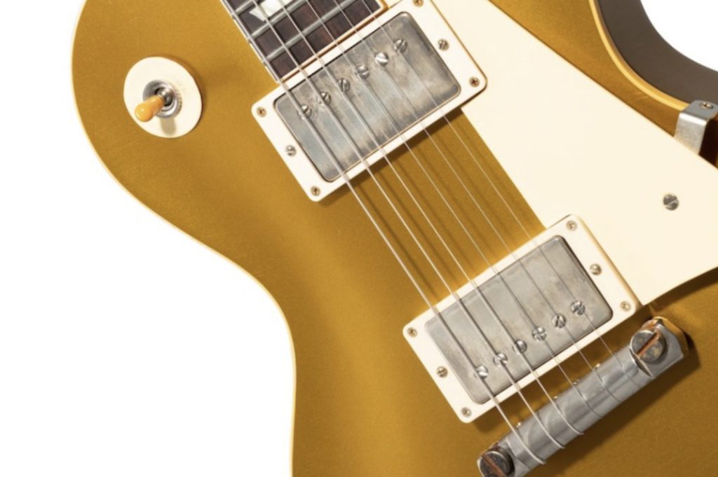 Aged gold nitrocellulose finish and all the hardware